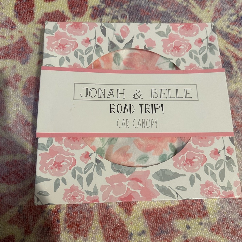 Baby girl car canopy (1 new/1 preowned)